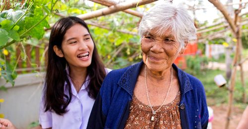 ministering with elderly woman