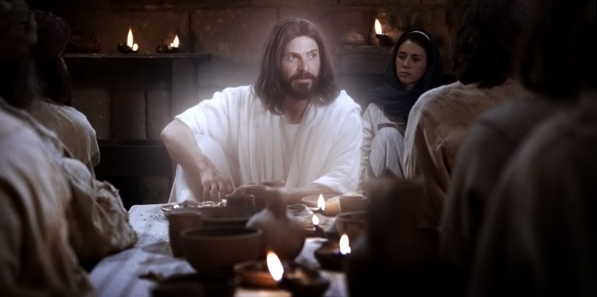 Jesus Christ sits with and teaches His Apostles and disciples after He is resurrected.