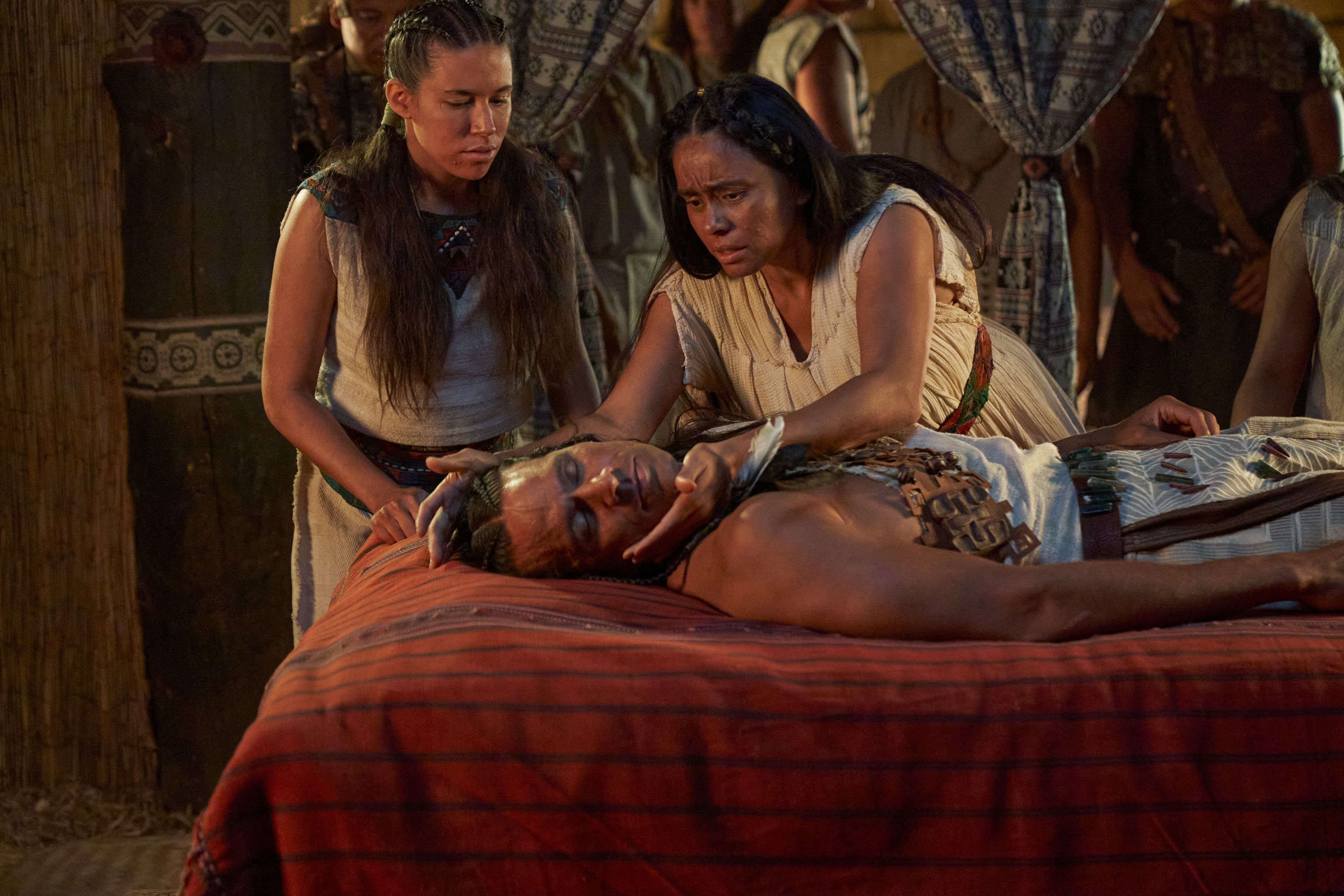 The wife of King Lamoni takes care of him as he lays as if he were dead in the land of Ishmael.