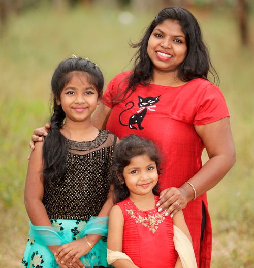 photo of two girls and mom in India