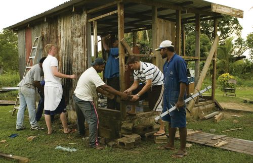 people working on building