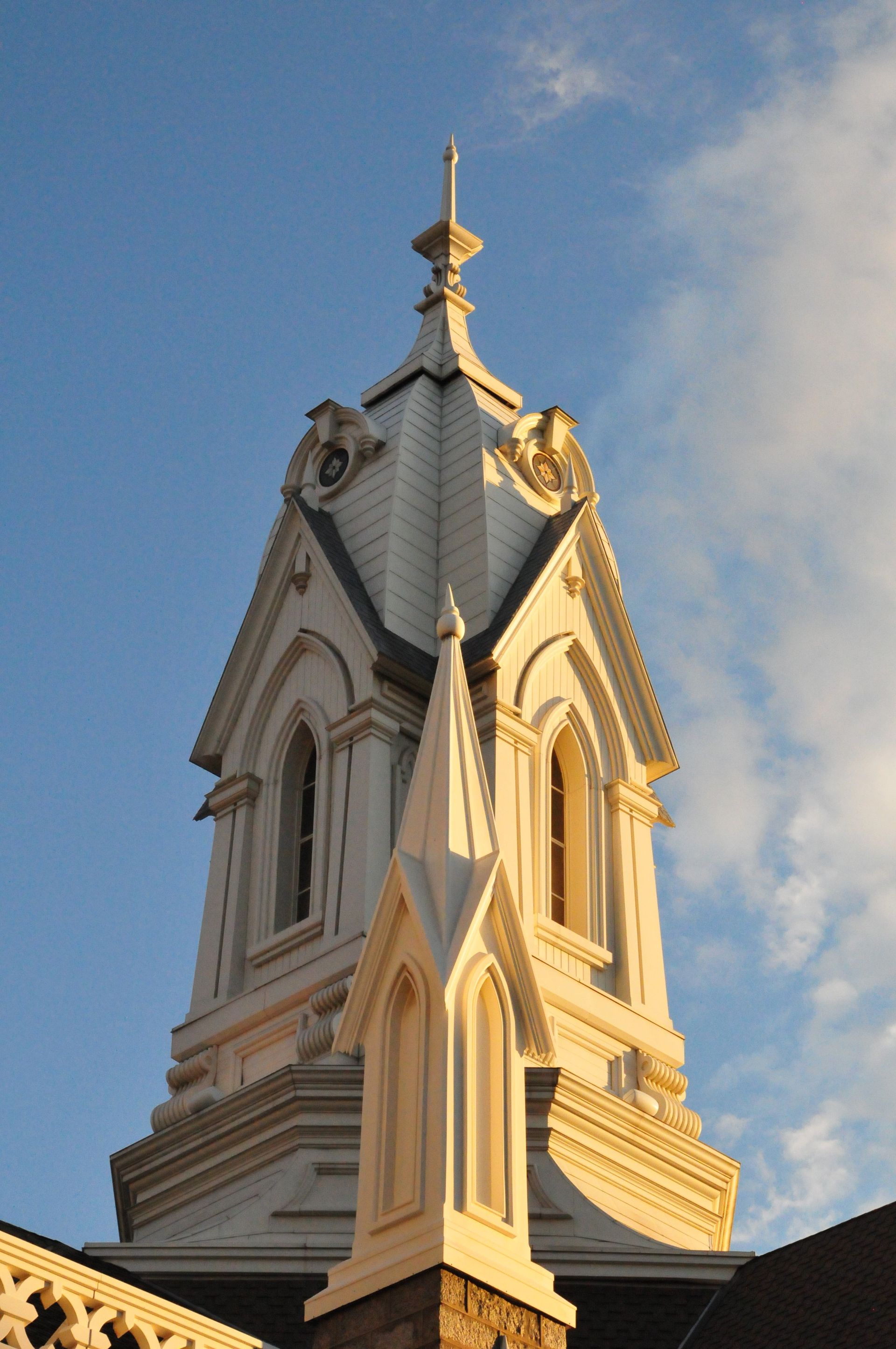 The white spire on top of the Assembly Hall on Temple Square.