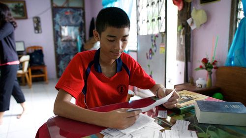 young man doing family history