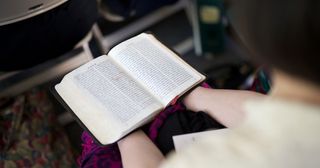 woman reading the scriptures