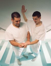 man being baptised