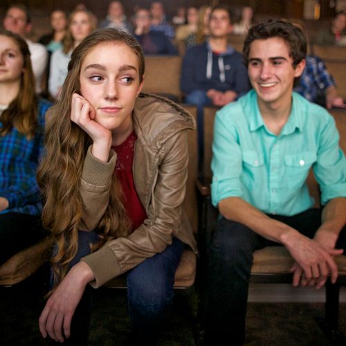 young woman and young man at a movie
