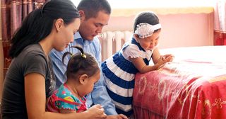 family praying