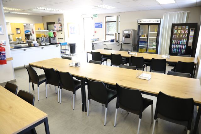 Photos of working and eating areas inside the South Africa Missionary Training Center