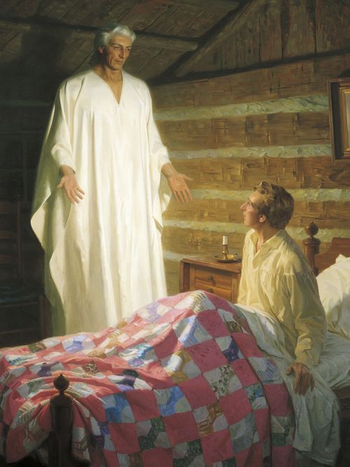 The Prophet Joseph Smith sitting on his bed in the Smith farm house. Joseph has a patchwork quilt over his knees. He is looking up at the angel Moroni who has appeared before him. Moroni is depicted wearing a white robe. The painting depicts the event wherein the angel Moroni appeared to the Prophet Joseph Smith three times in the Prophet's bedroom during the night of September 21, 1823 to inform him of the existence and location of the gold plates, and to instruct him as to his responsibility concerning the plates.