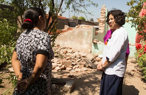 Reyna I. Aburto visiting with people in Mexico