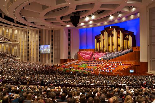 people gathered inside the Conference Center for general conference