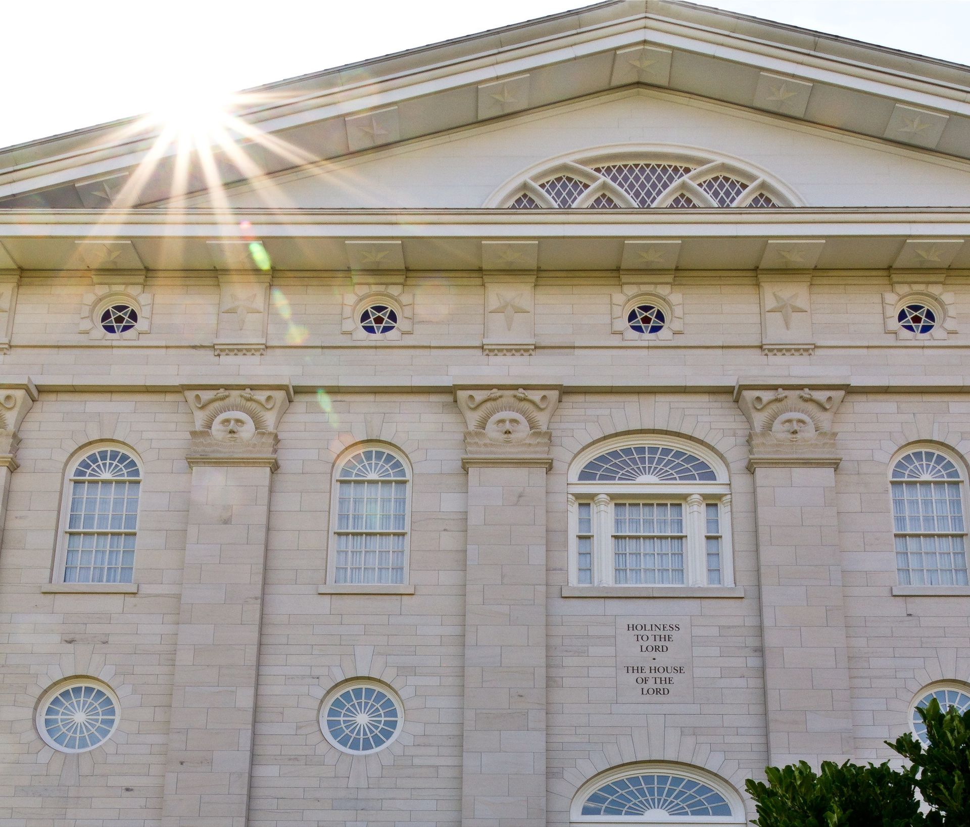 The Nauvoo Illinois Temple exterior, including symbols.