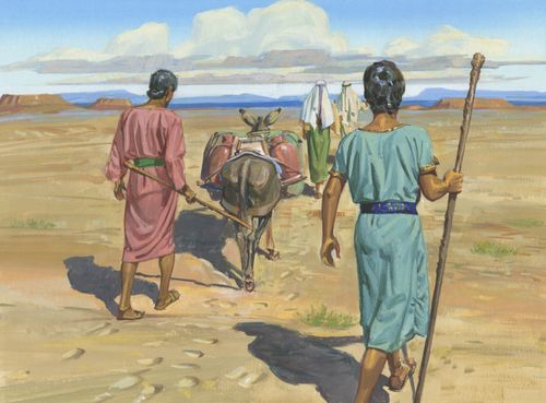 saudara-saudara berjalan di pasir gurun