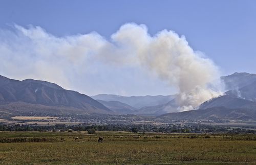 cloud of smoke from wildfire in Salem, Utah