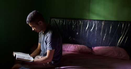 young man reading scriptures