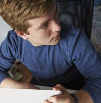 young man with laptop