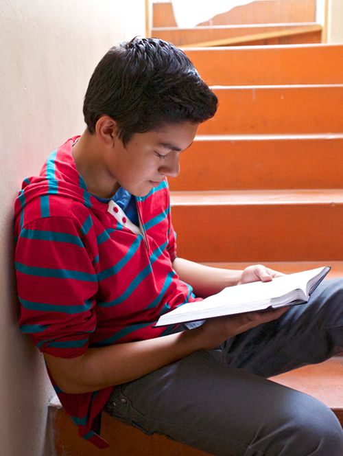 young man reading scriptures