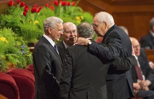 Elder Perry talking with General Authorities/ Apostles