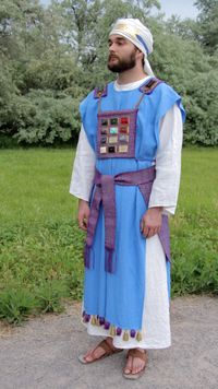 man dressed in ancient high priest clothing