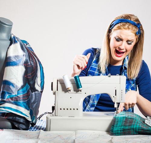 woman sewing a dress