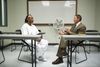 A man, presumably a chaplain or member of a bishopric, sits in a room visiting with an inmate. They appear to be in conversation together.   Special Services of the Priesthood department has requested that PSD capture images of various Correctional facilities that will be used on websites and curriculum targeted to spiritually support LDS members in correctional confinement and their families.