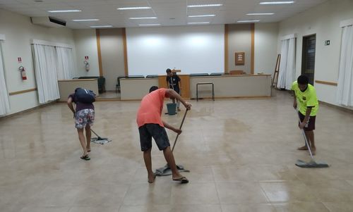 youth cleaning a chapel