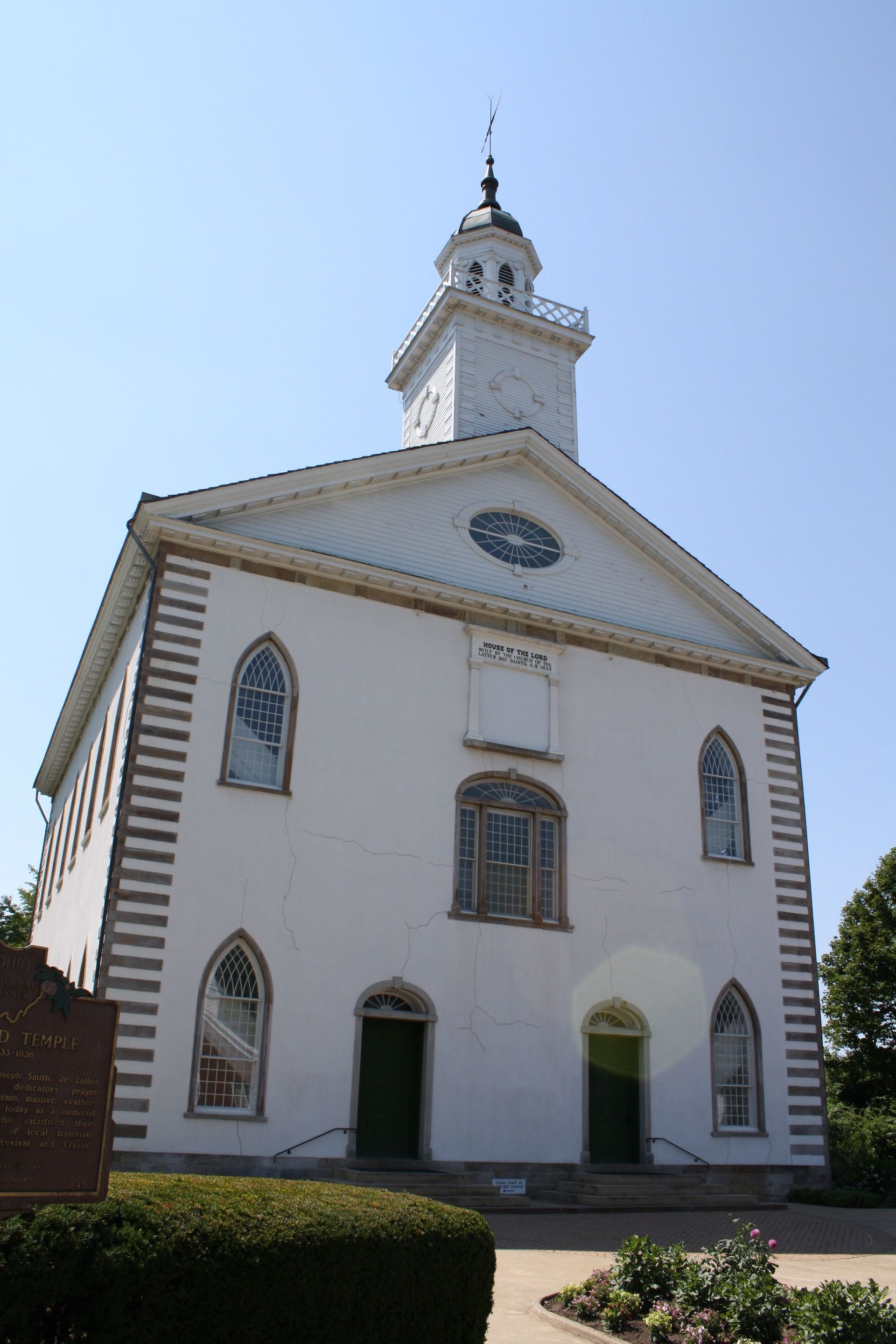 The Kirtland Temple entrance, including scenery and the exterior of the temple.