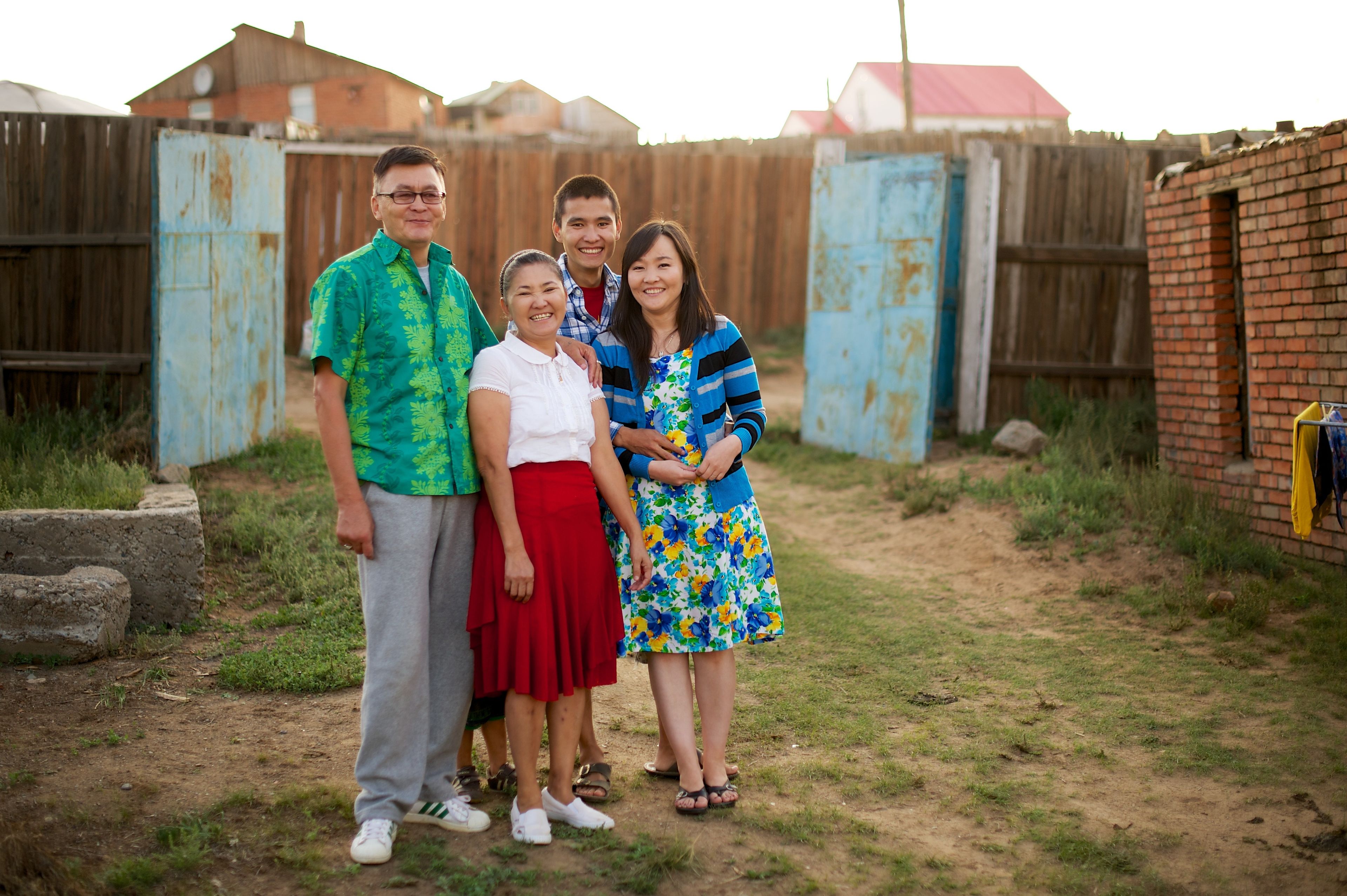 An outdoor portrait of members of a family in Mongolia.
