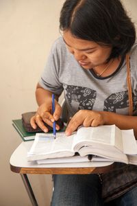 student marking scriptures