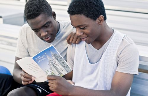 young men reading