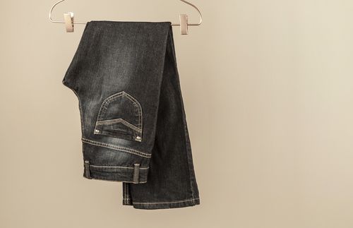 pair of jeans on a hanger
