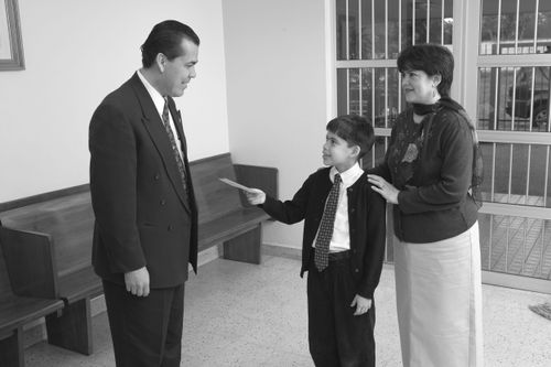 child paying tithing