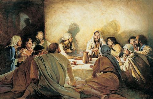 Jesus Christ seated at a table with His Apostles