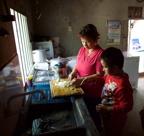 mother and son cooking