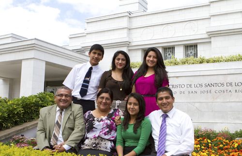 family in front of temple