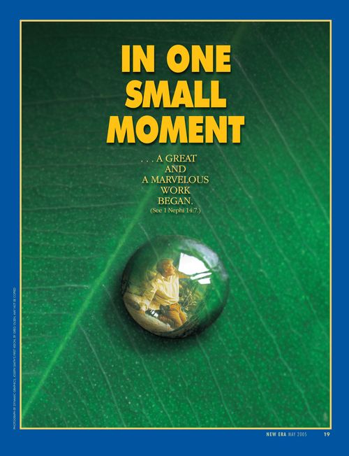 A poster depicting a drop of water on a leaf, reflecting a painting of the First Vision, paired with the words “In One Small Moment.”
