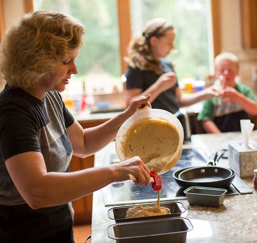 woman pouring batter