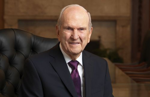 President Russell M. Nelson seated in black chair