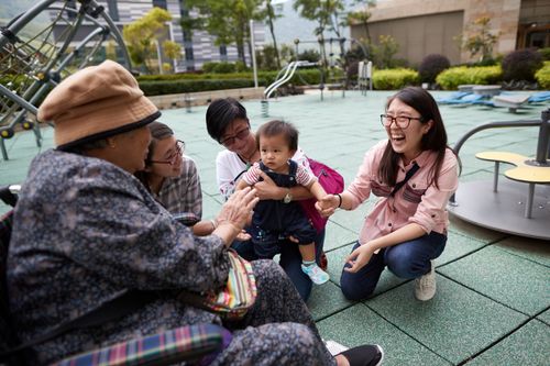 family together in a park