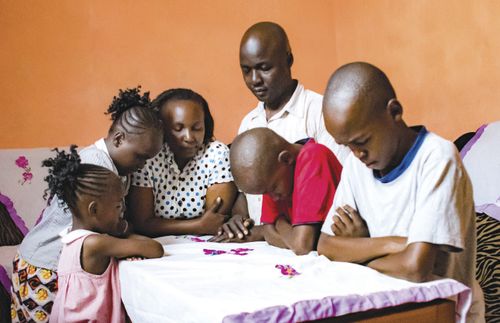 African family praying