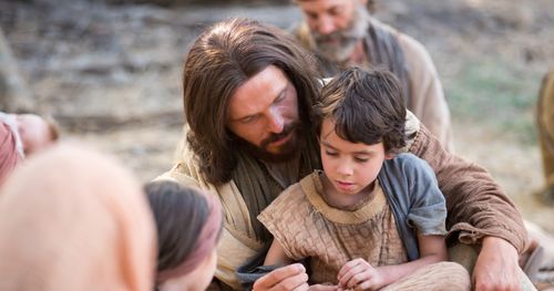 Jesus sitting with children