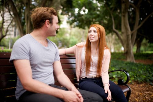 couple sitting on bench