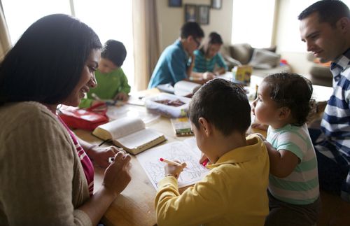 a family sitting around a table