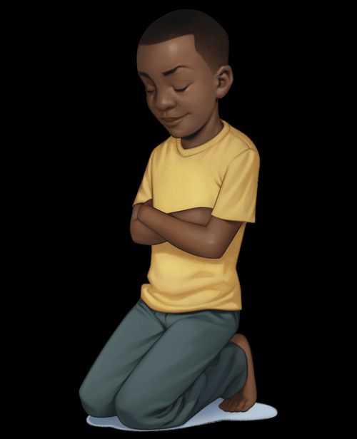 A boy praying on his knees