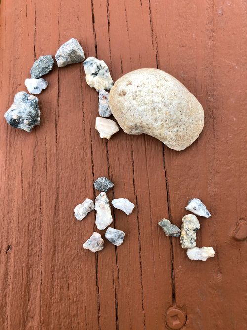 Art created by Ezra using rocks to show Jesus rising from the tomb