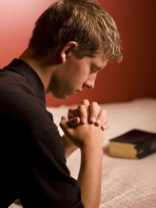 young man praying