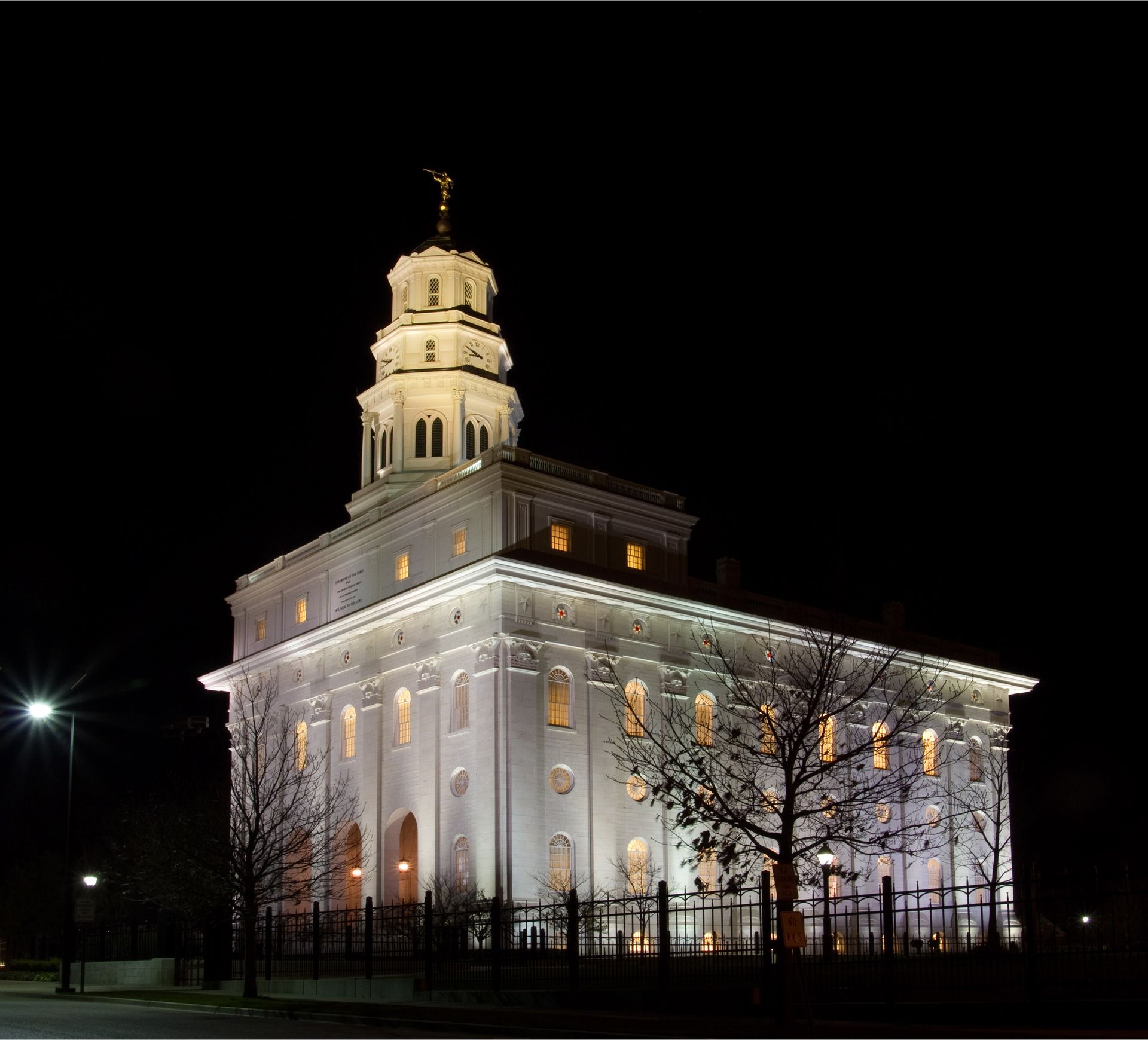 The Nauvoo Illinois Temple in the evening, including scenery.