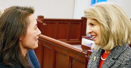 Carol F. McConkie speaking with woman