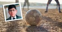 young man and soccer ball