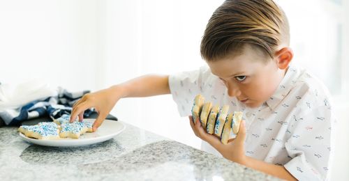 boy taking cookies